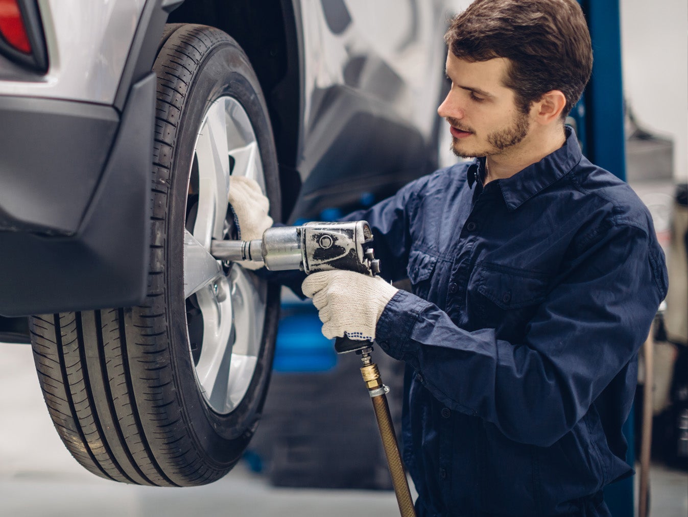 A technician working on tire.